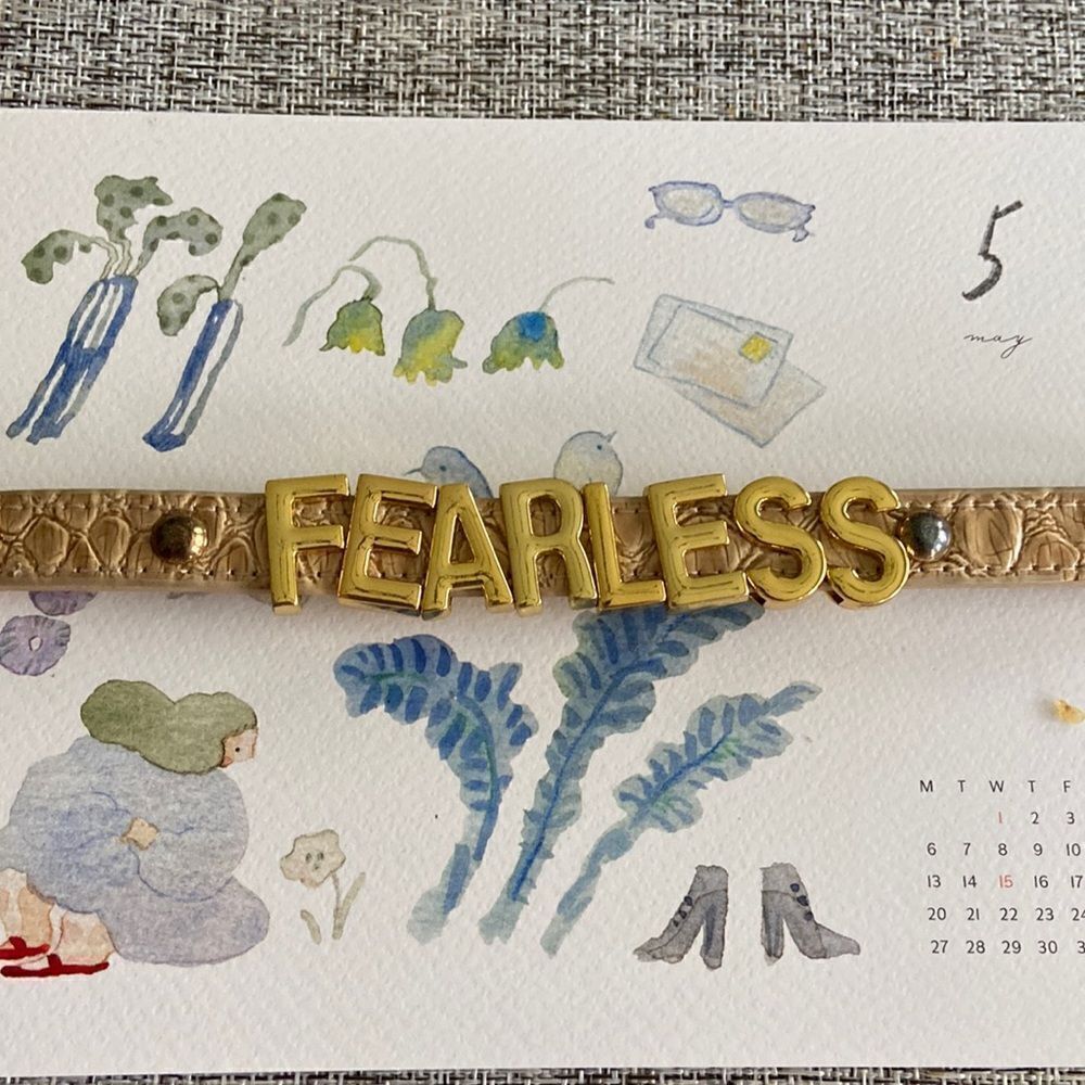 Bracelet candy arm gold color  words cream leather